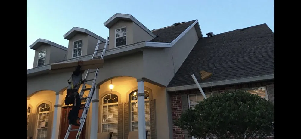 Slide of Belcher Roofing