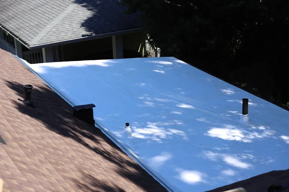 Slide of Bell Roofing