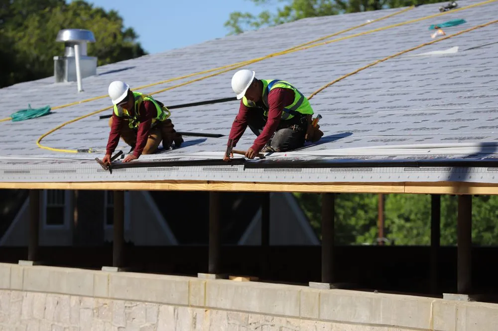 Slide of Bell Roofing