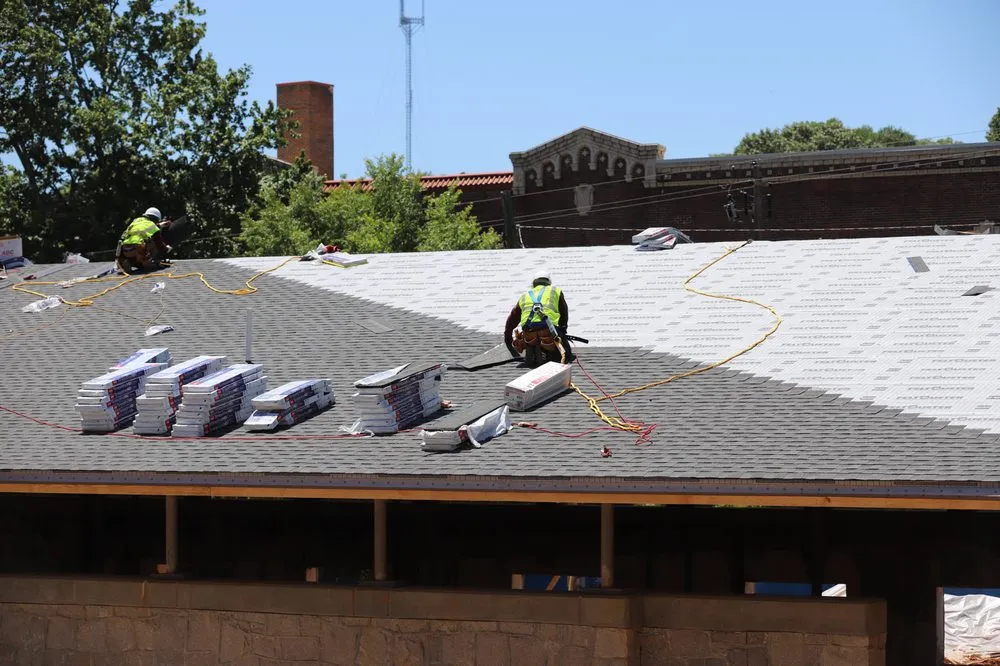 Slide of Bell Roofing