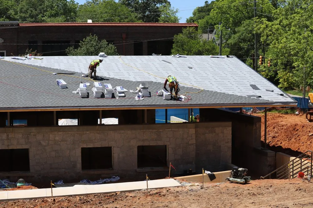 Slide of Bell Roofing