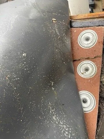 Slide of Bell Roofing