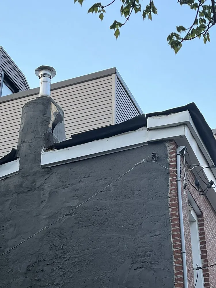 Slide of Bell Roofing