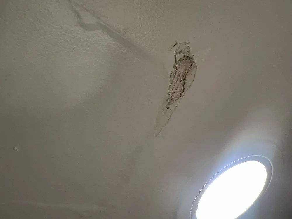 Slide of Bell Roofing