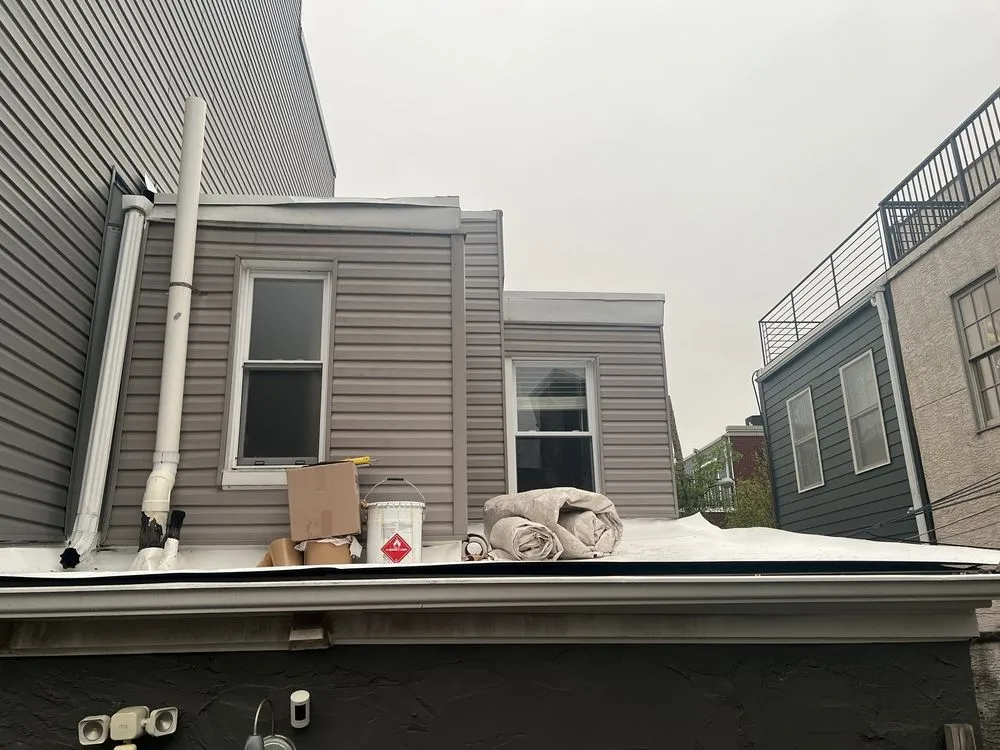 Slide of Bell Roofing