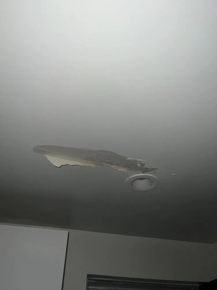 Slide of Bell Roofing