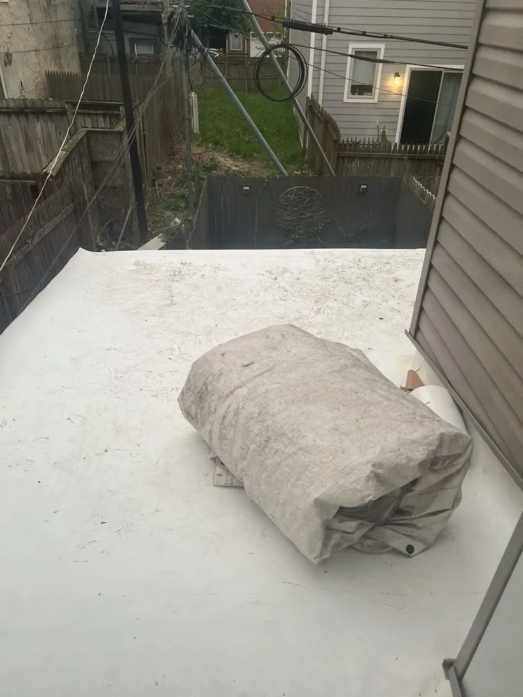 Slide of Bell Roofing