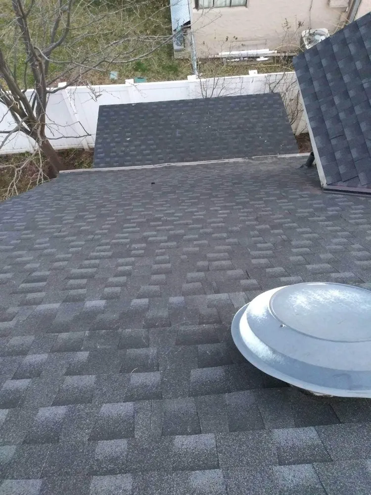 Slide of Bell Top Roofing