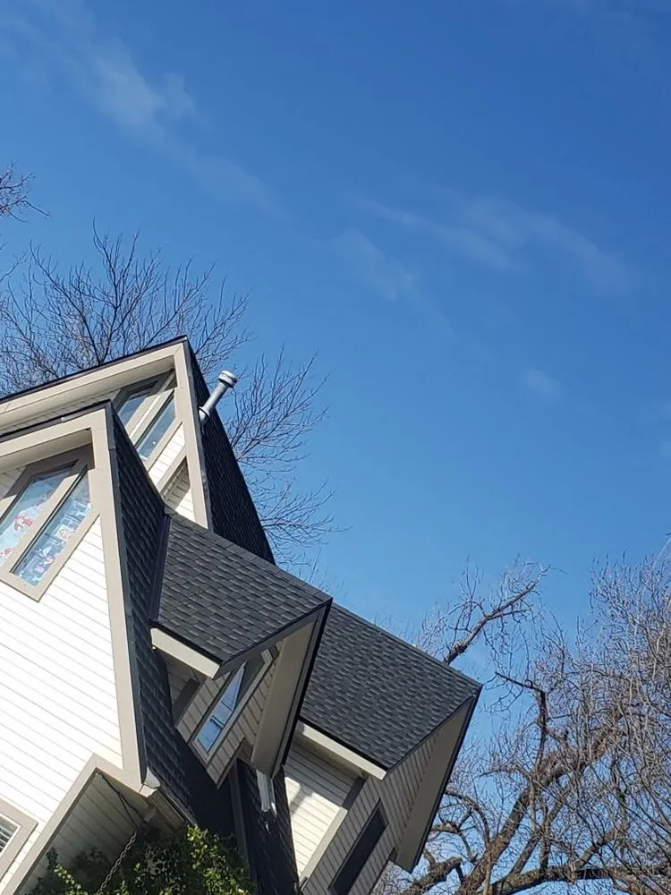 Slide of Bell Top Roofing