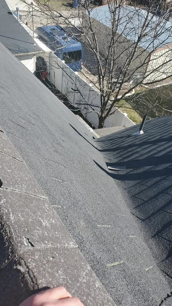 Slide of Bell Top Roofing