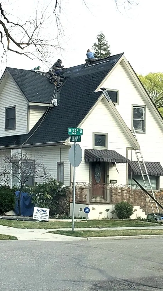 Slide of Bell Top Roofing