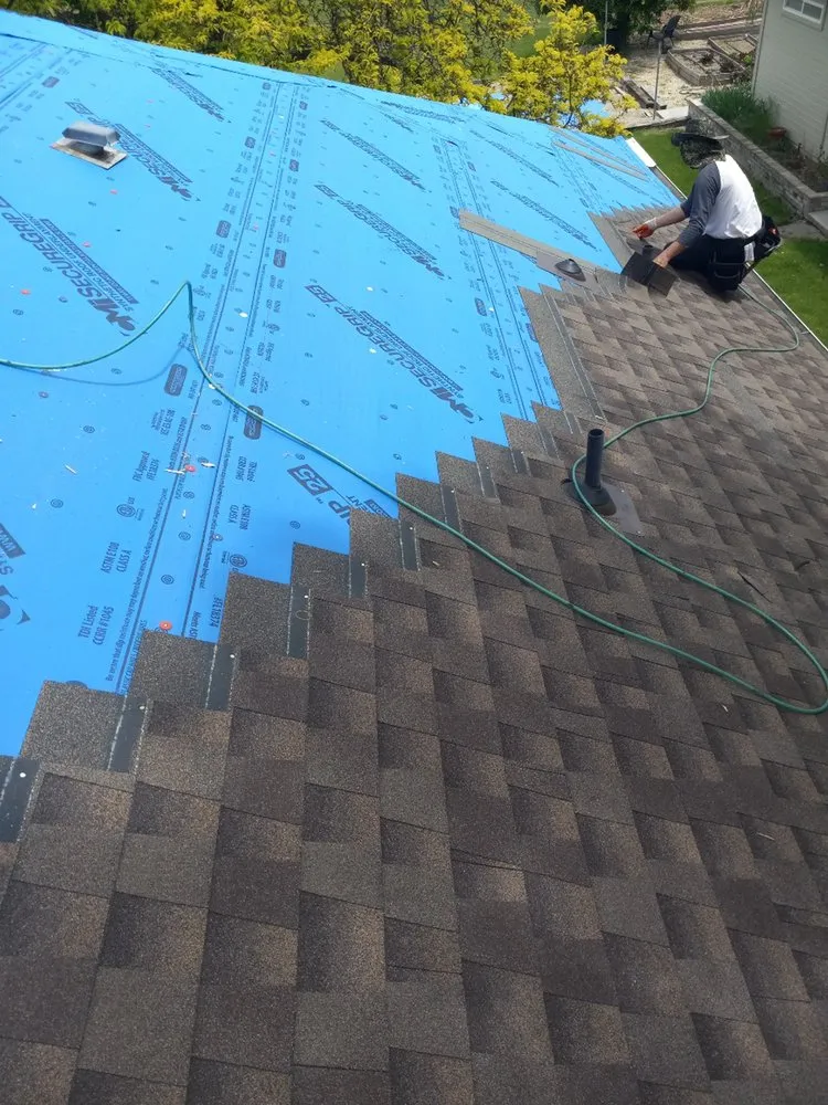 Slide of Bell Top Roofing