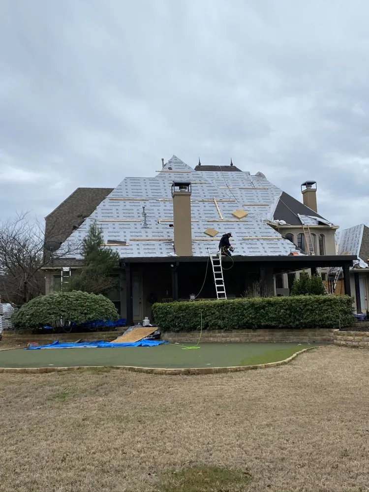 Slide of Bella Roofing & Construction