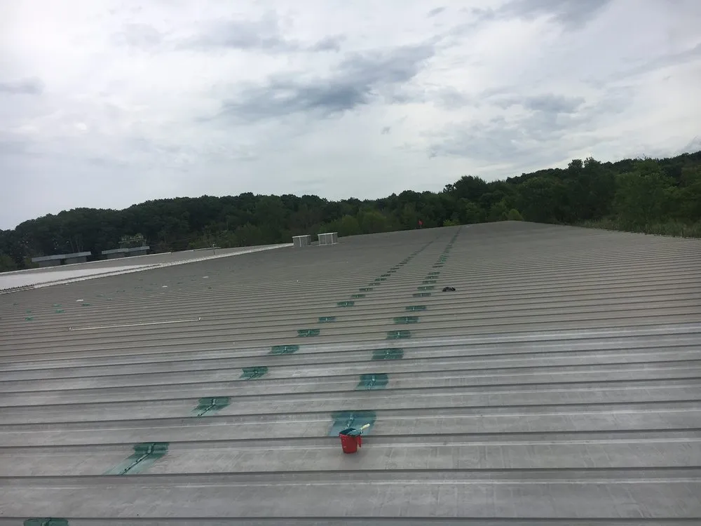 Slide of Bella Roofing