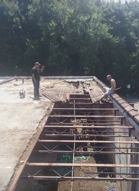 Slide of Bella Roofing