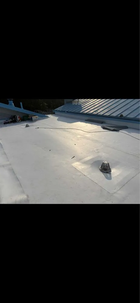 Slide of Bella Roofing