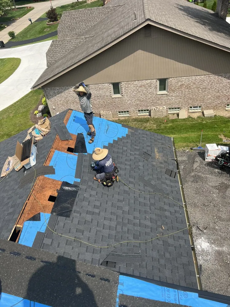 Slide of Bella’s Roofing