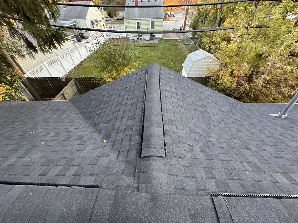 Slide of Bella’s Roofing