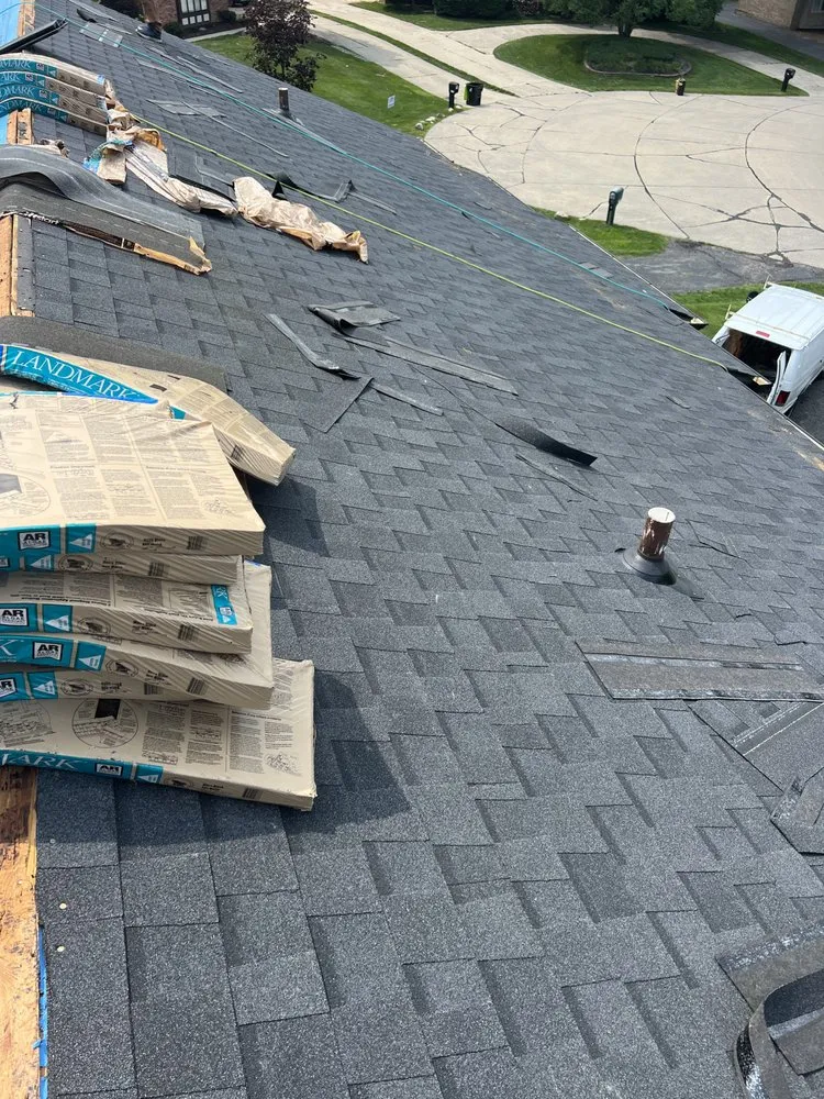 Slide of Bella’s Roofing