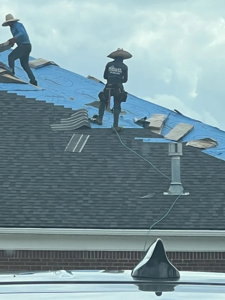 Slide of Bella’s Roofing