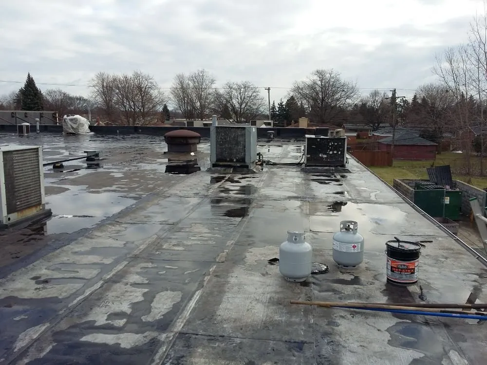 Slide of Bellenir Roofing