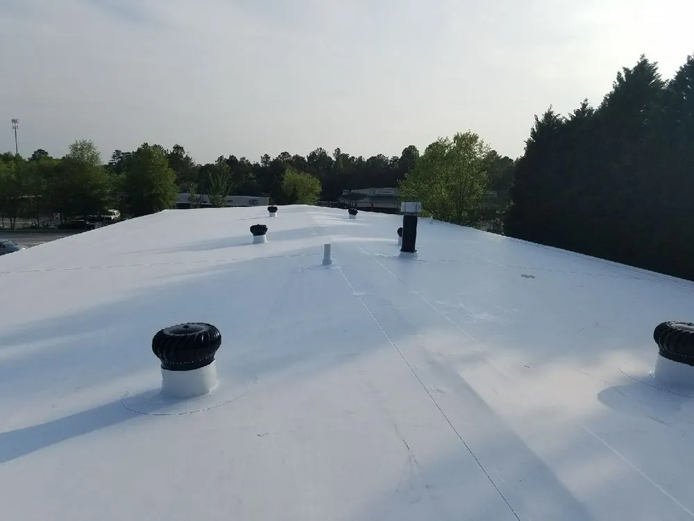 Slide of Ben Roofing