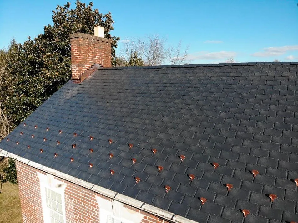 Slide of Benchmark Roofers