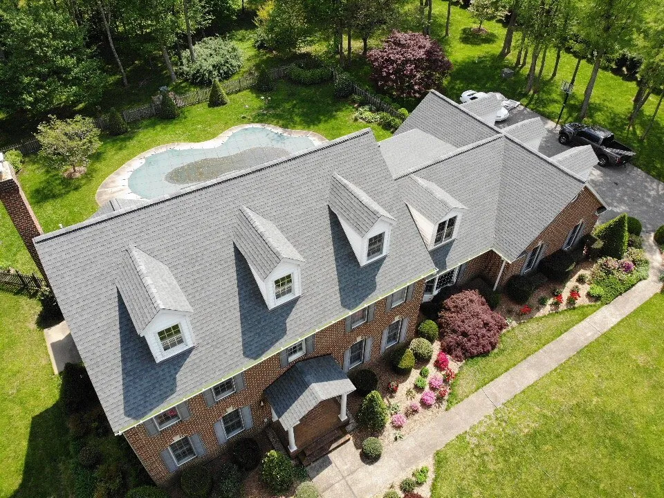 Slide of Benchmark Roofers