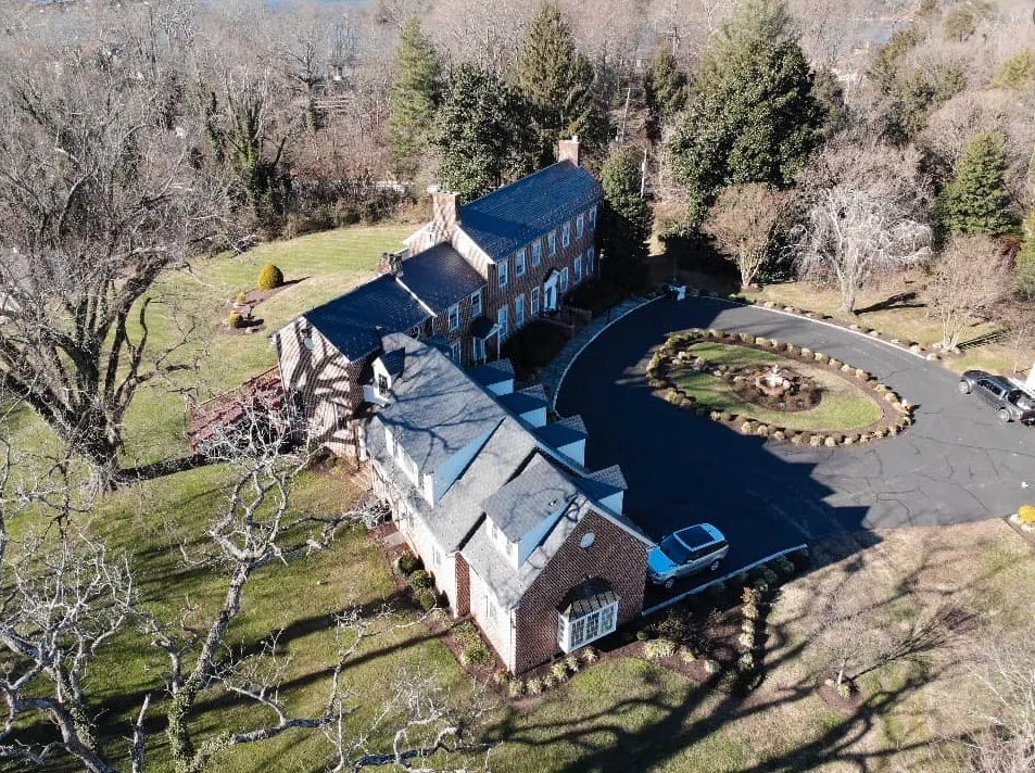 Slide of Benchmark Roofers