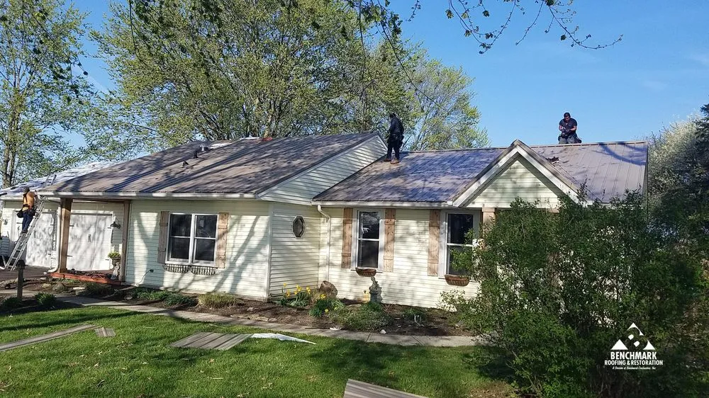 Slide of Benchmark Roofing & Restoration