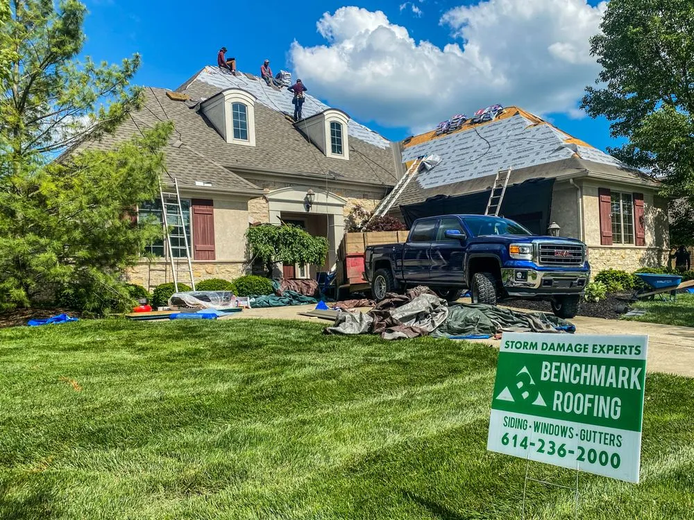 Slide of Benchmark Roofing & Restoration