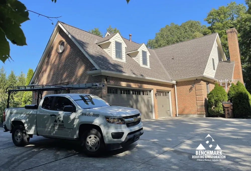 Slide of Benchmark Roofing & Restoration