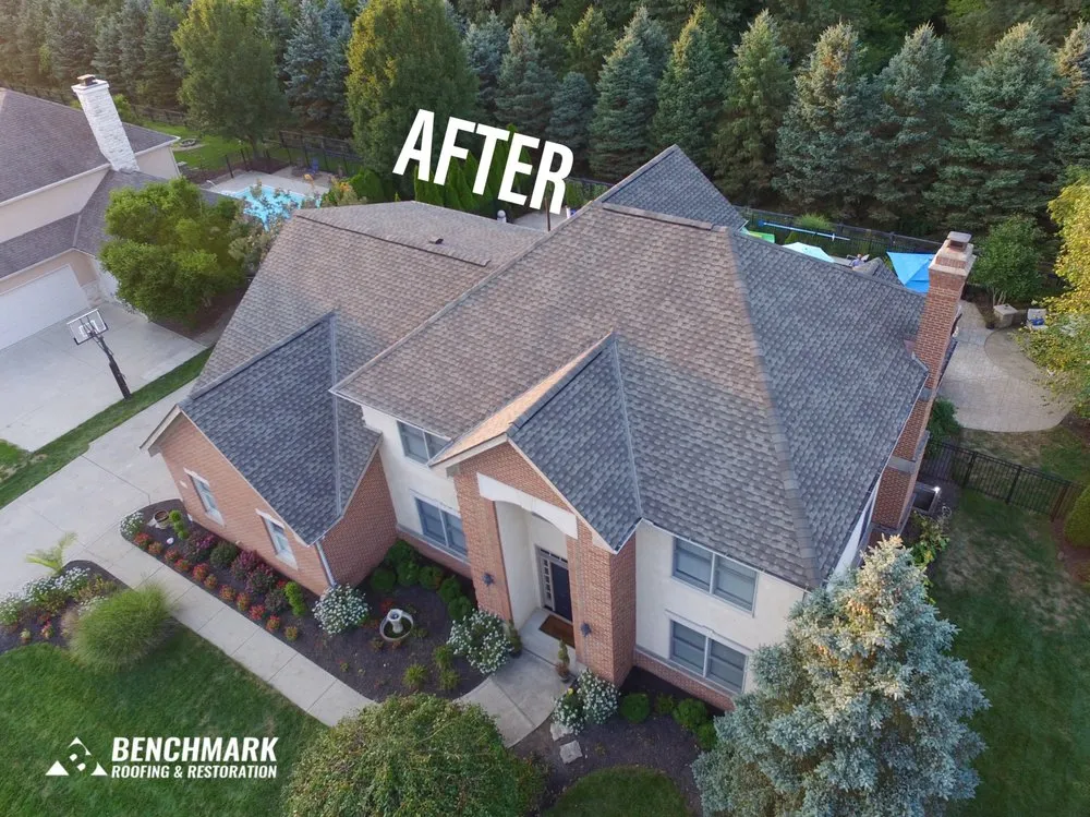 Slide of Benchmark Roofing & Restoration