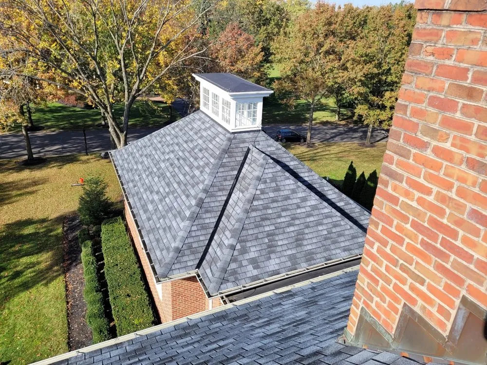 Slide of Benchmark Roofing & Restoration