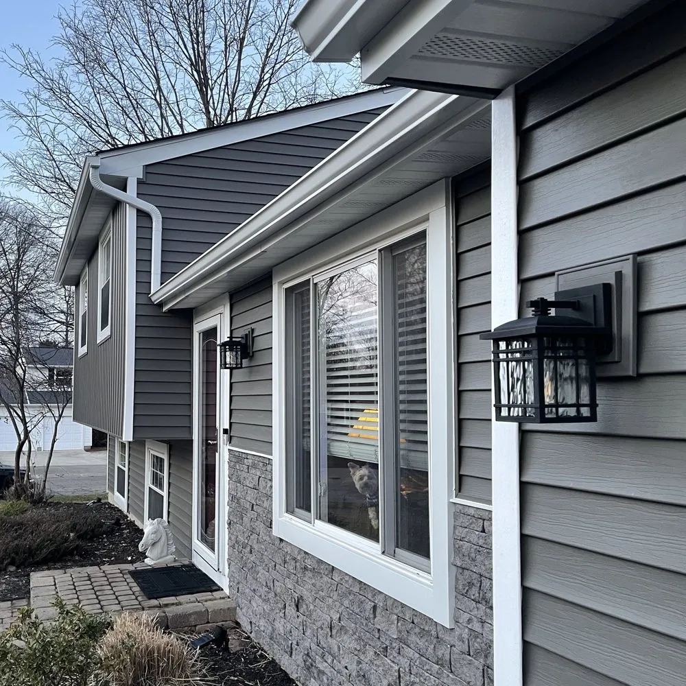 Slide of Benchmark Roofing & Restoration