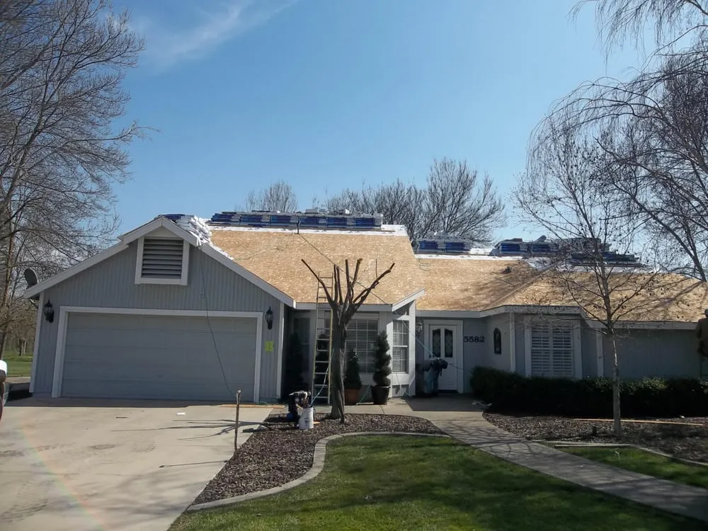 Slide of Benchmark Roofing