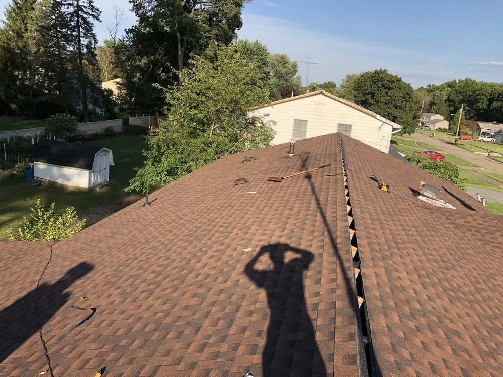 Slide of Bender Roofing