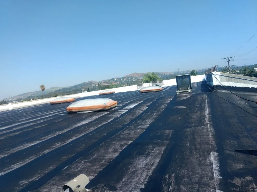 Slide of Benitez Roofing & Waterproofing