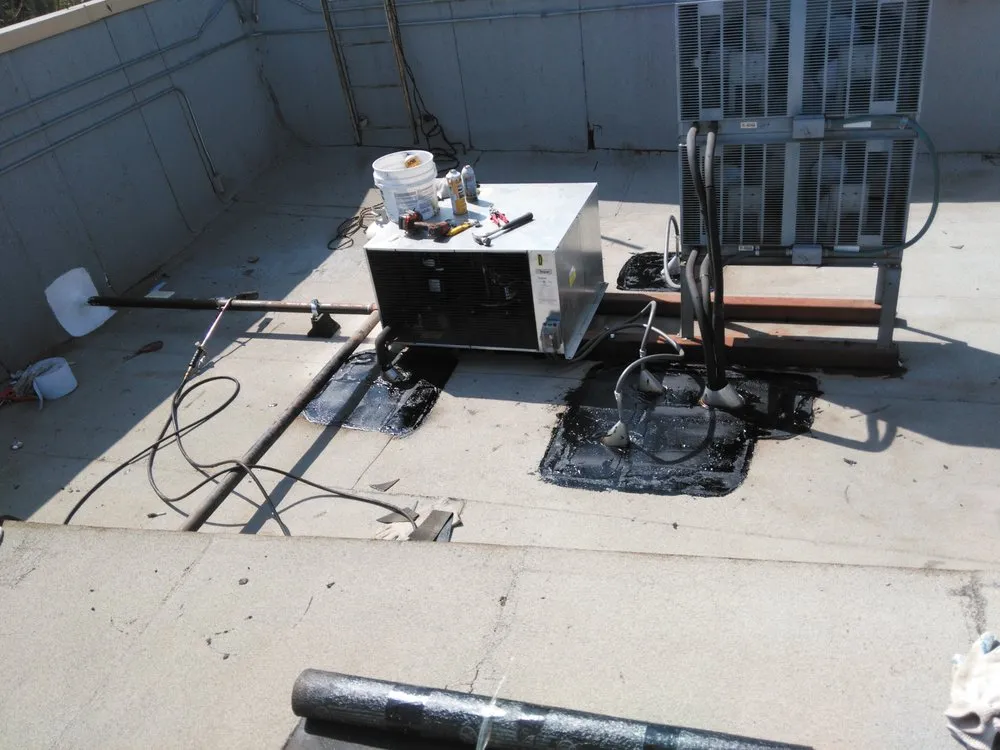 Slide of Benitez Roofing & Waterproofing