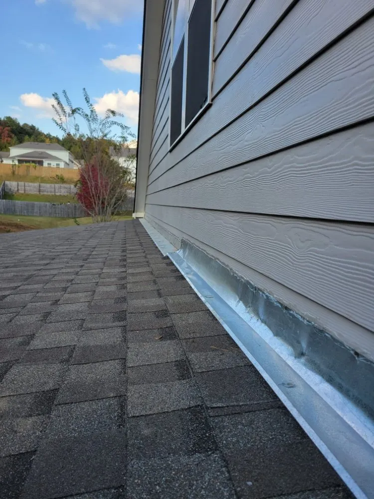 Slide of Benitez Roofing