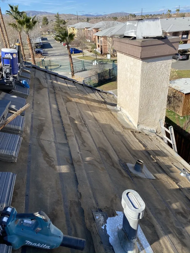 Slide of Benny’s Roofing Services