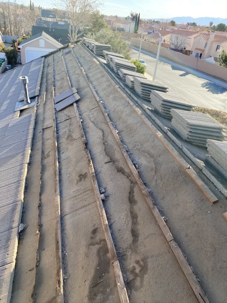 Slide of Benny’s Roofing Services