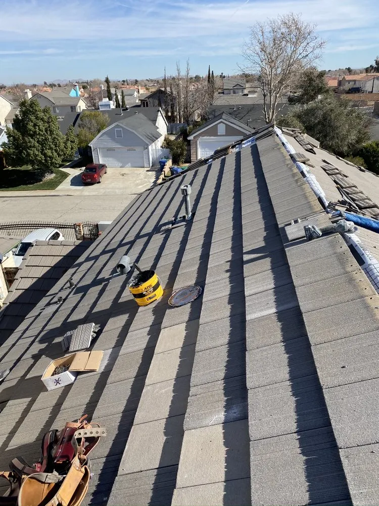 Slide of Benny’s Roofing Services