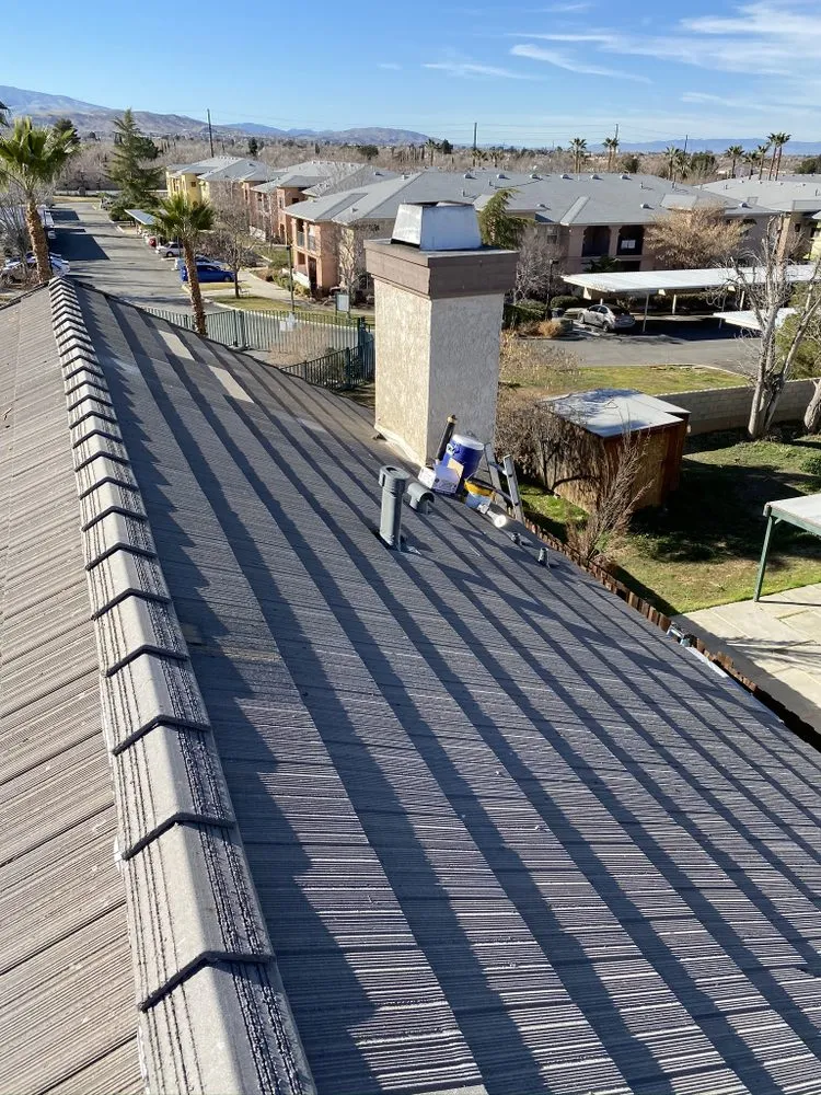 Slide of Benny’s Roofing Services