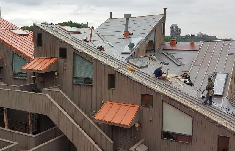 Slide of Benny's Roofing