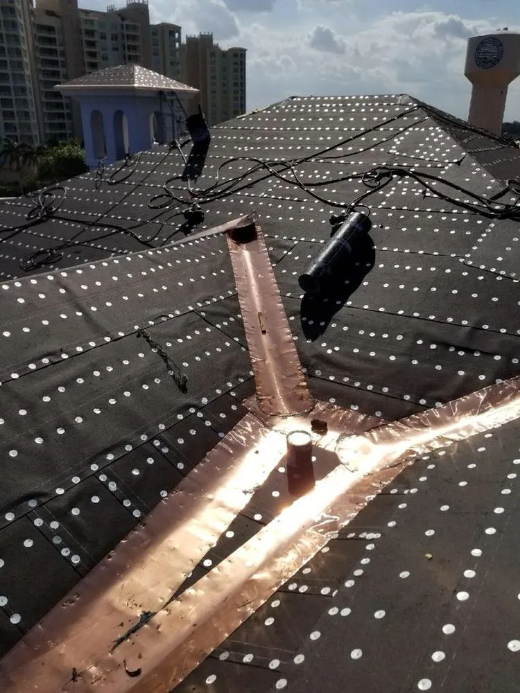 Slide of Bentley Roofing