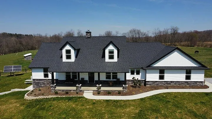 Local storm damage roof repair in Holmesville, OH by Benton Roofing