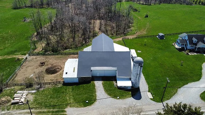 Licensed metal roofing installation experts serving Holmesville, OH - Benton Roofing