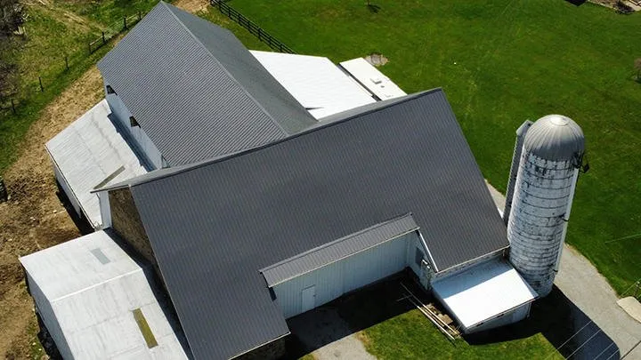 Local storm damage roof repair with free inspection in Holmesville, OH by Benton Roofing