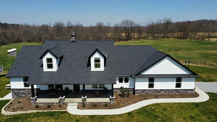 Licensed metal roofing installation with free inspection in Holmesville, OH by Benton Roofing